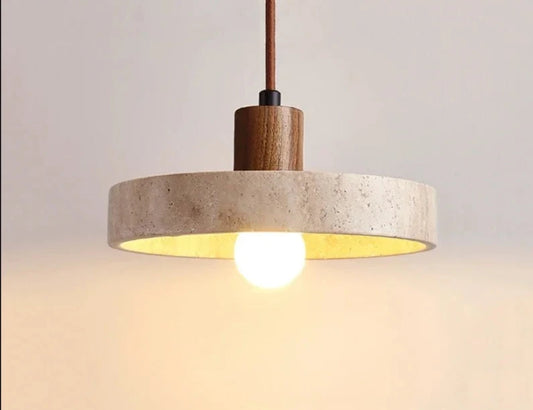 Handcrafted Japanese Wabi Sabi Yellow Cave Stone Pendant Lamp hanging in a living room